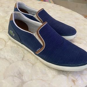 Men’s blue Lacoste slip on loafers